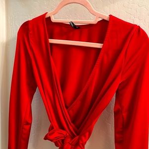 Red satin wrap long sleeve top with waist tie